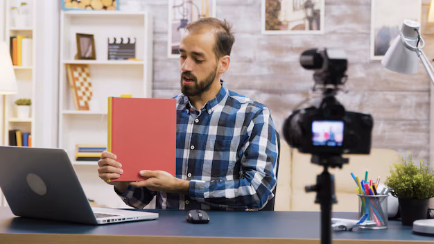 famous young vlogger recording review book subscribers vlogger lifestyle_482257 25175
